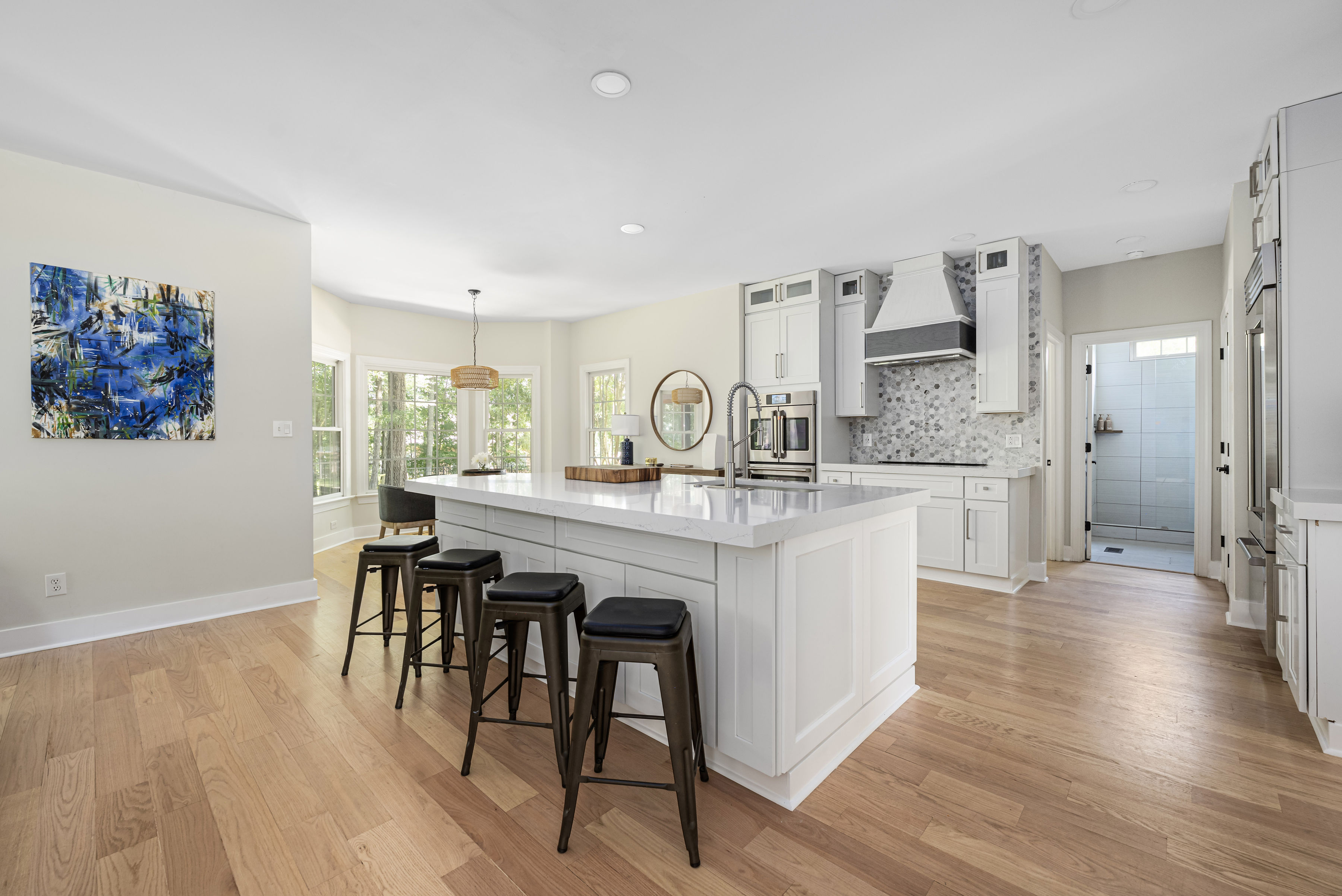 Gourmet kitchen featuring a Sub-Zero refrigerator and Café double oven.