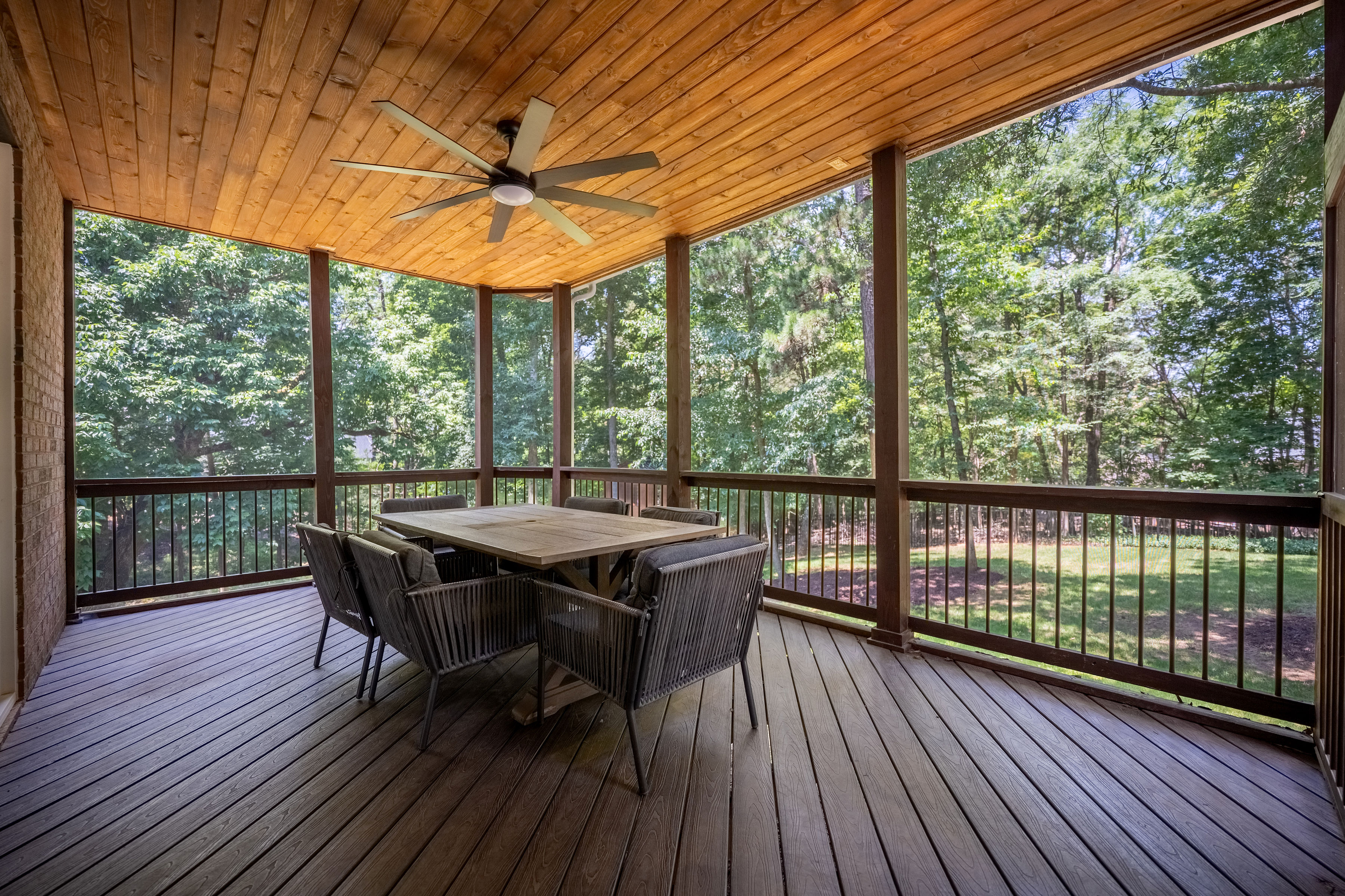 Screened porch dining area.